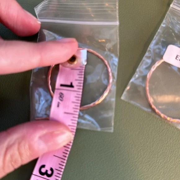 Gold colored hanging hoop earrings - Picture 5 of 6